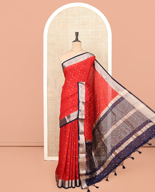 Red Assam Silk Saree, Steeped with Zari Buttas, Complemented by a Contrast Traditional Zari Border, Zari Striped Pallu, and a Contrast Blouse