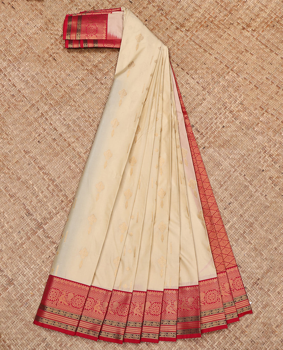 Cream Budget Silk Saree, Entralled with Zari Buttas All Over Its Body, Complemented by a Contrast Traditional Zari Design Border, Grand Jaal Pallu, and Paired with a Contrast Blouse