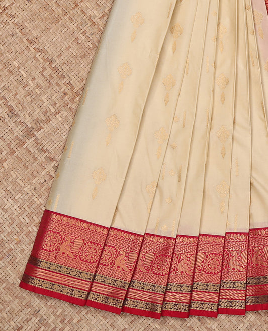 Cream Budget Silk Saree, Entralled with Zari Buttas All Over Its Body, Complemented by a Contrast Traditional Zari Design Border, Grand Jaal Pallu, and Paired with a Contrast Blouse
