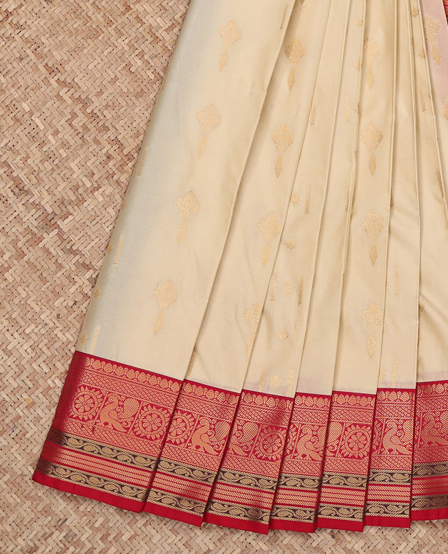 Cream Budget Silk Saree, Entralled with Zari Buttas All Over Its Body, Complemented by a Contrast Traditional Zari Design Border, Grand Jaal Pallu, and Paired with a Contrast Blouse