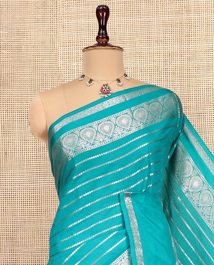 Green Assam Silk Saree, Opulently Embellished with Zari Stripes, Highlighted by a Traditional Zari Border, Zari Design Pallu, and a Matching Blouse