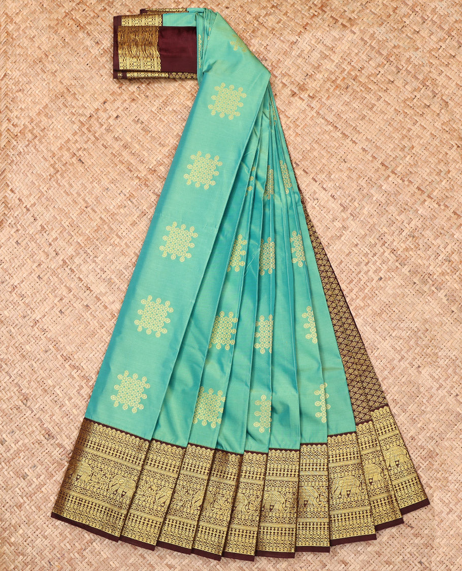 Green Budget Silk Saree, Adorned with Kolam Buttas, Complemented by a Contrast Traditional Zari Border, Grand Pallu, and a Contrast Blouse