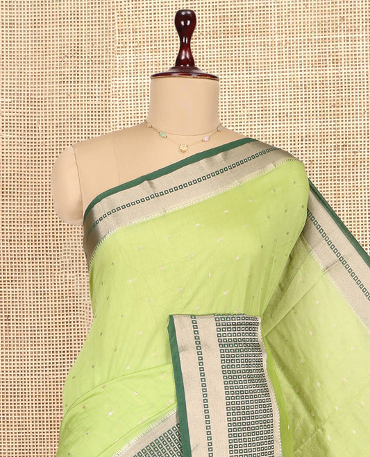 Green Assam Silk Saree, Graced with Zari Buttas, Complemented by Contrast Traditional Zari Border,  Zari Woven Pallu, and Contrast Blouse