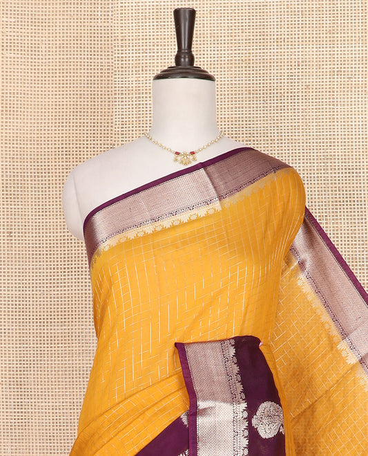 Yellow zari checked Assam silk saree, contrast traditional zari border of paisleys, and pallu of zari stripes
