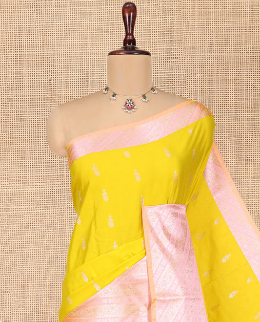 Yellow Budget Silk Saree, Sparsely Woven with Zari Buttas All Over Its Body, Complemented by Contrast Border of Floral-Paisley Designs, Beautifully Bedecked Pallu of Jaal Designs, and Paired with a Contrast Blouse