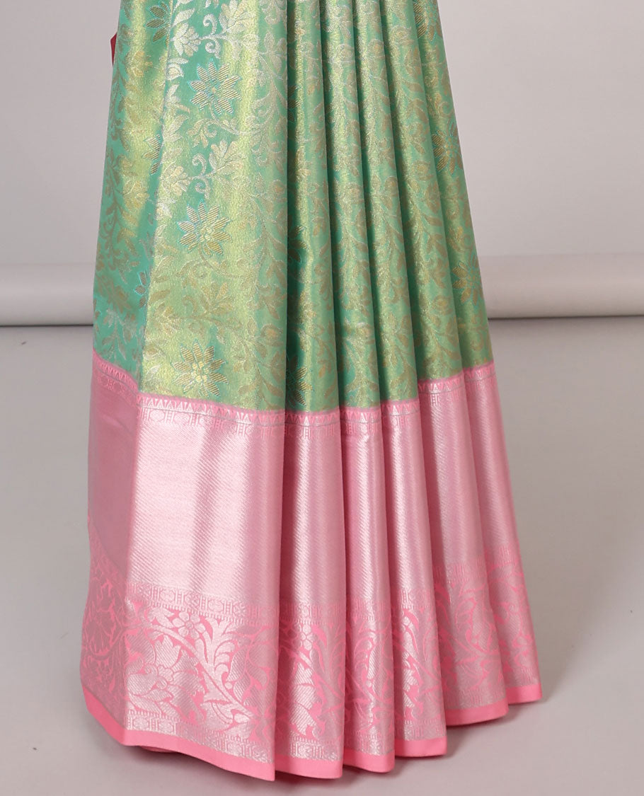 Green jacquard budget silk saree with contrast traditional saree & floral buttas , striped pallu
