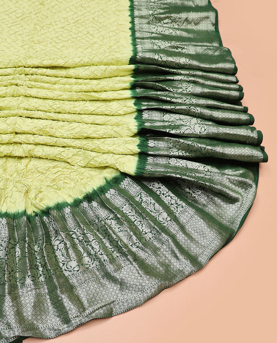 Light green bandhani silk saree with contrast zari design border & floral design pallu