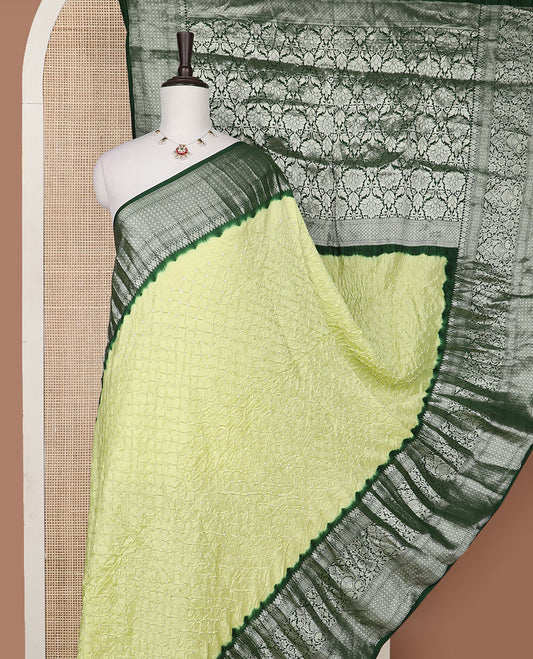 Light green bandhani silk saree with contrast zari design border & floral design pallu