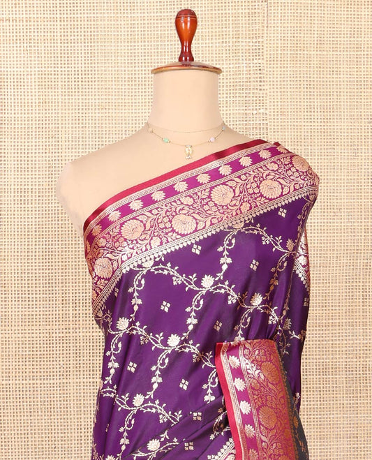 Purple Semi-Banaras Saree, Majestically Detailed with Jaal Jacquard on Its Body, Complemented by Floral Creeper Design Border, Intricately Designed Pallu, and Paired with a Contrast Blouse