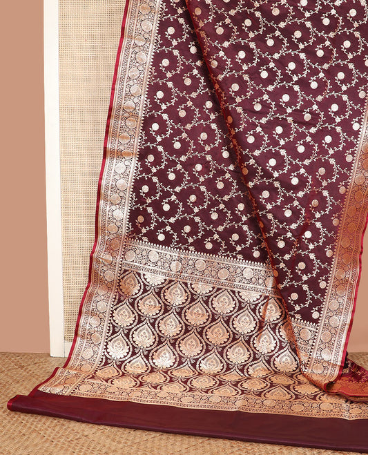 Maroon floral jaal jacquard banarasi silk saree, floral creeper design border, and ogee patterned pallu