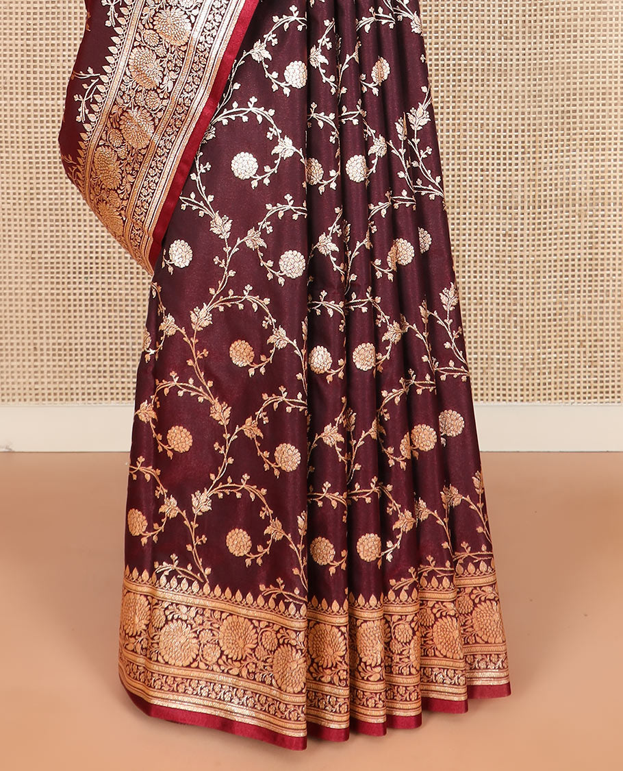 Maroon floral jaal jacquard banarasi silk saree, floral creeper design border, and ogee patterned pallu