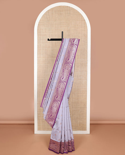 Lavender paisley design butter silk saree with contrast paisley zari design border & floral design pallu