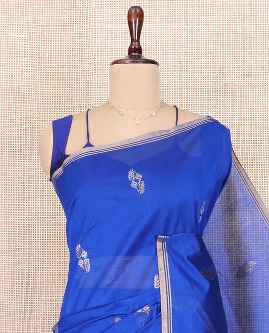 Royal Blue Chanderi Cotton Saree, Elevated with Buttas All Over Its Body, Highlighted by a Zari Piping Border, Pallu Steeped with Zari Designs, and Paired with a Matching Blouse