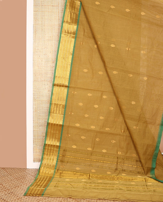 Green Venkatagiri Cotton Saree, Accentuated with Buttas on Its Body, Complemented by Contrast Border of Traditional Zari Designs, Zari Striped Pallu, and Comes Without a Blouse
