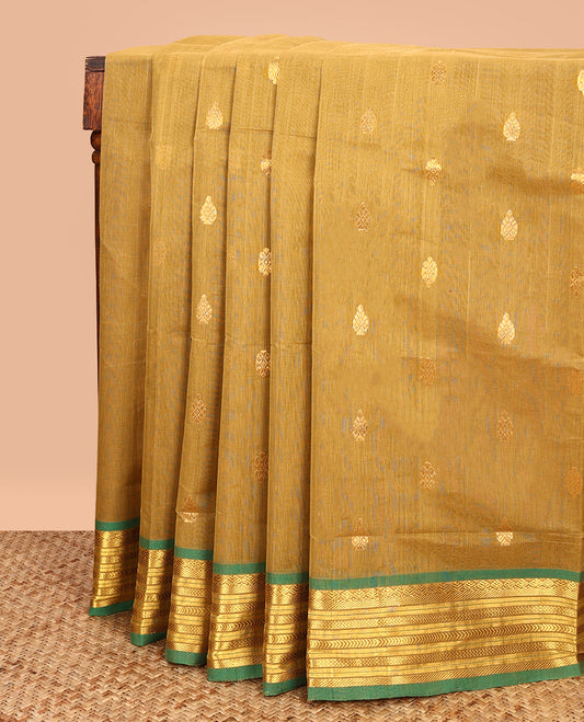 Green Venkatagiri Cotton Saree, Accentuated with Buttas on Its Body, Complemented by Contrast Border of Traditional Zari Designs, Zari Striped Pallu, and Comes Without a Blouse