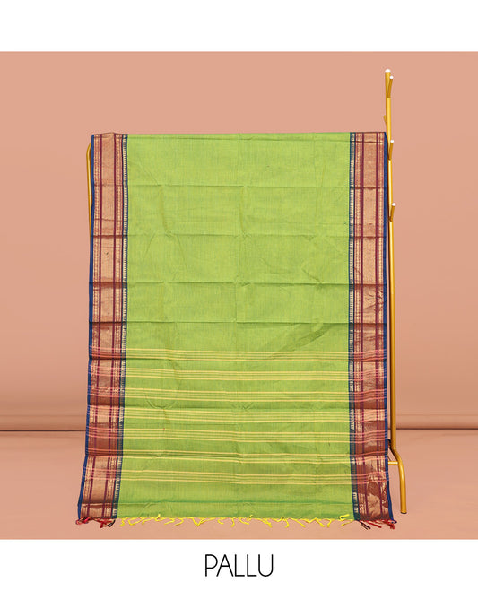 Leaf Green Plain Chettinad Cotton Saree, Complemented by Contrast Traditional Zari Design Border, Pallu of Stripes, and Paired with a Matching Blouse