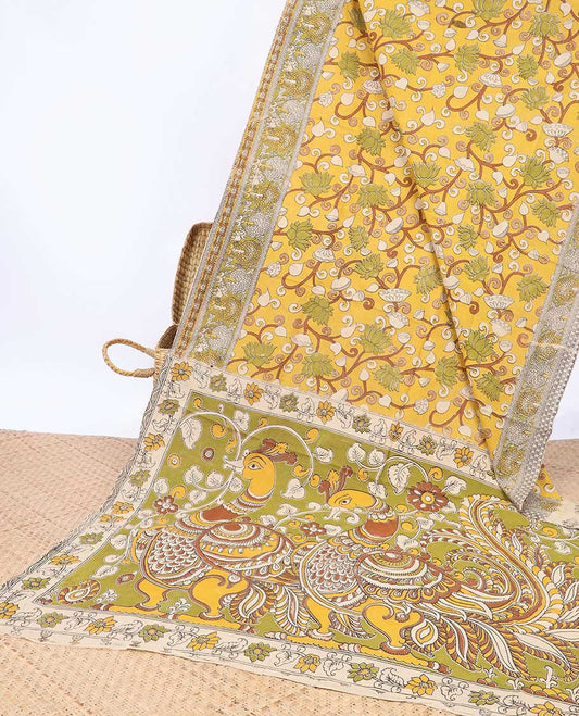 Yellow floral machine-printed kalamkari cotton saree, contrast floral printed border & kalamkari peacock pallu