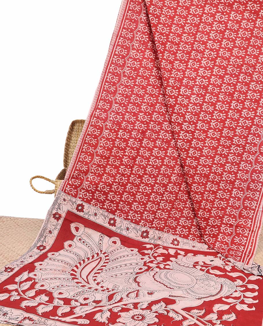 Red batik machine-printed kalamkari cotton saree, self-border & pallu of peacock motifs