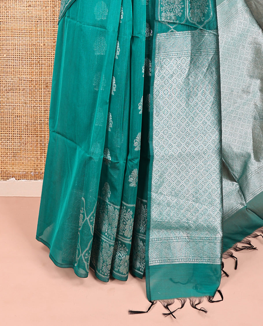 Green Semi-Silk Cotton Saree, Elevated with Zari Buttas All Over Its Body, a Subtle Border of Floral Designs, Grand Jaal Pallu, and Paired with a Matching Blouse