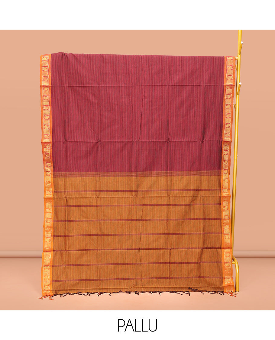 Maroon Poly Cotton Saree, Subtly Sparkled with Stripes on Its Body, Complemented by Contrast Traditional Zari Border of Paisleys, Striped Pallu, and Paired with a Contrast Blouse