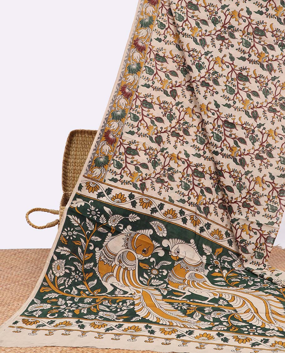 Cream floral vine design printed kalamkari cotton saree with contrast floral border & pallu of peacock design