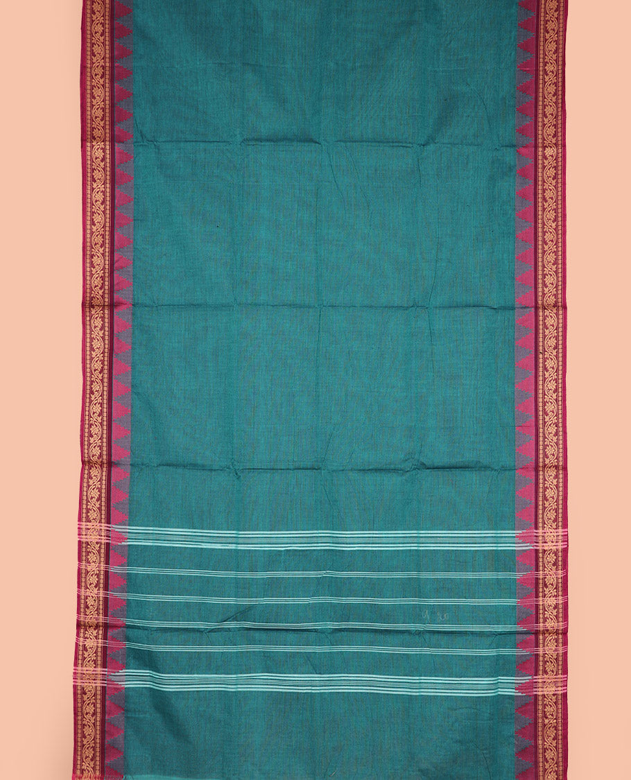 Peacock green plain nine-yard cotton saree, contrast traditional temple border, and striped pallu