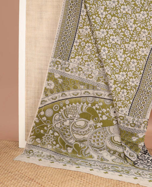Green floral machine printed kalamkari cotton saree, geometric printed border, and pallu of peacock print