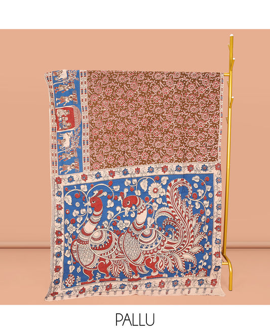Brown Machine-Printed Kalamkari Cotton Saree, Decked Up with Floral Motifs on Its Body, Complemented by a Contrast Village-Theme Printed Border, Pallu of Peacock Motifs Print, and Paired with a Printed Blouse