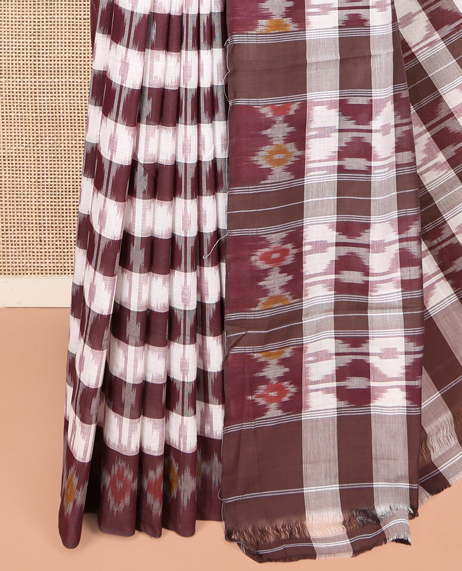 Off-White and Brown Ikkat Cotton Saree, Detailed with Ikkat Checks All Over Its Body, Subtly Sparkled Ikkat-Textured Border, Ikkat-Textured Pallu, and Has No Blouse