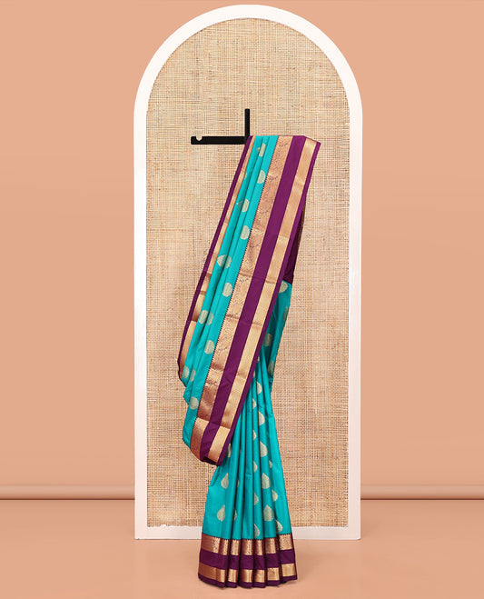 Rama Green and Purple Budget Silk Saree, Accentuated with Zari Buttas All Over Its Body, Complemented by Contrast Rettai Pettu Traditional Zari Designs Woven Border, Grand Pallu and Paired with a Contrast Blouse