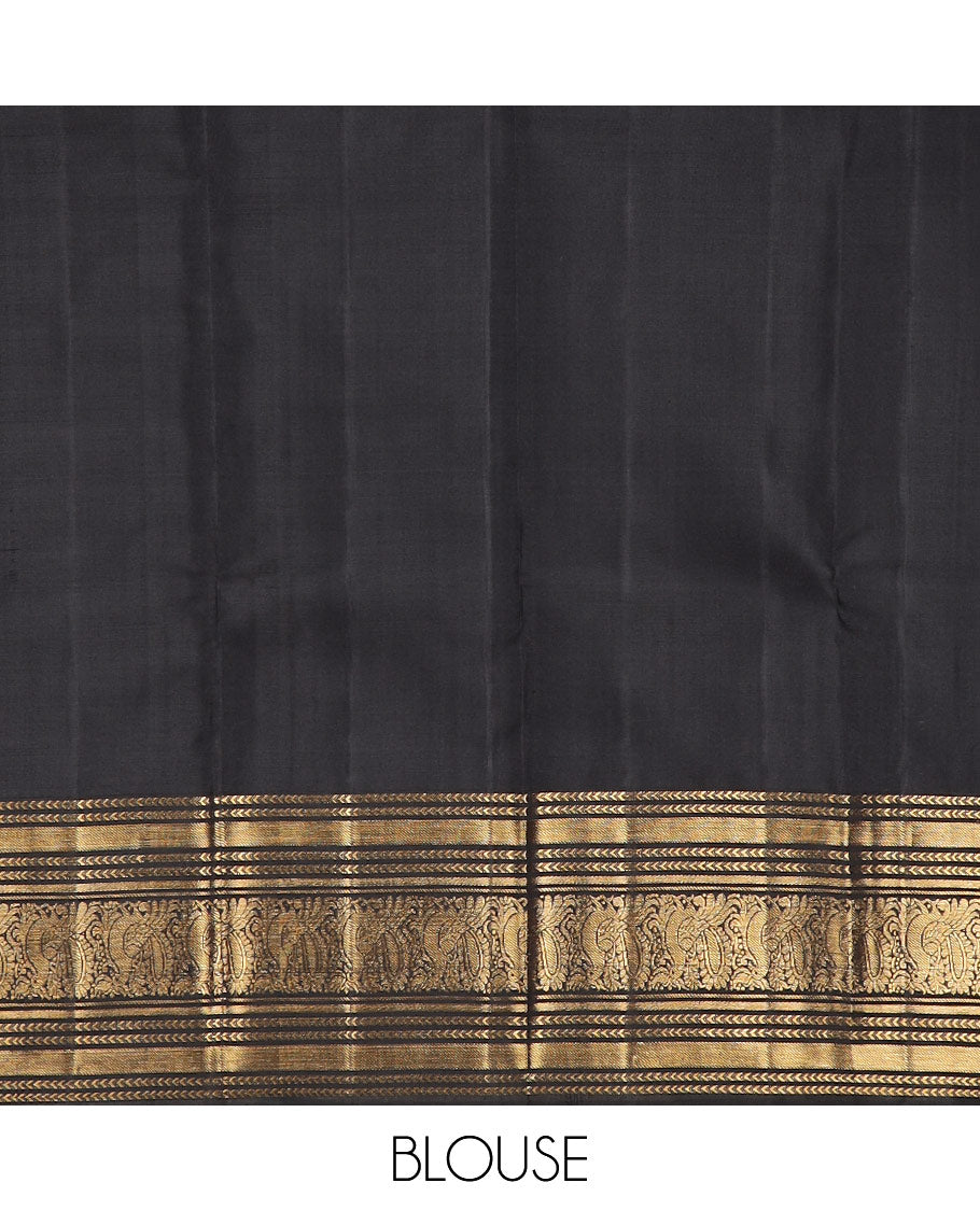 Yellow zari striped Kanchipuram silksaree, contrast border of kathir, and mayil designs, and pallu of mayil kann designs