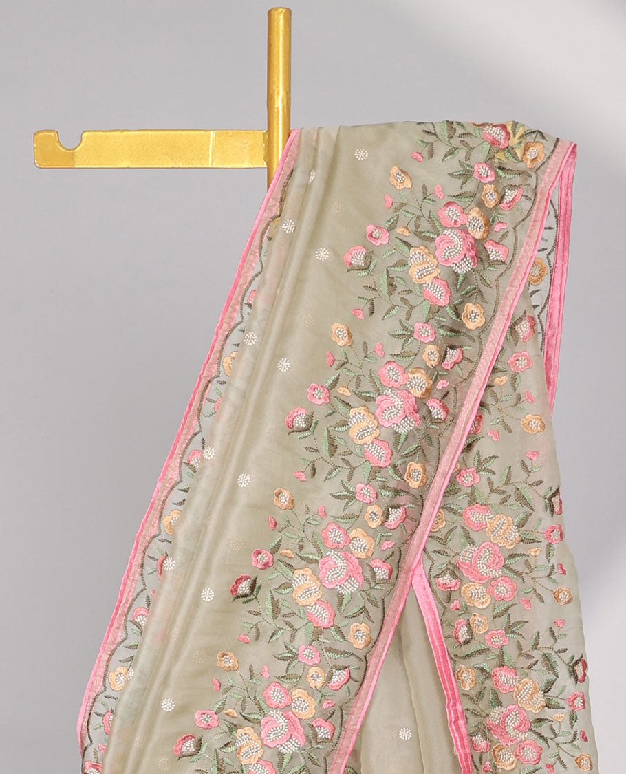 Light green motifs embroidery net designer saree with self floral border & floral embroidery pallu 