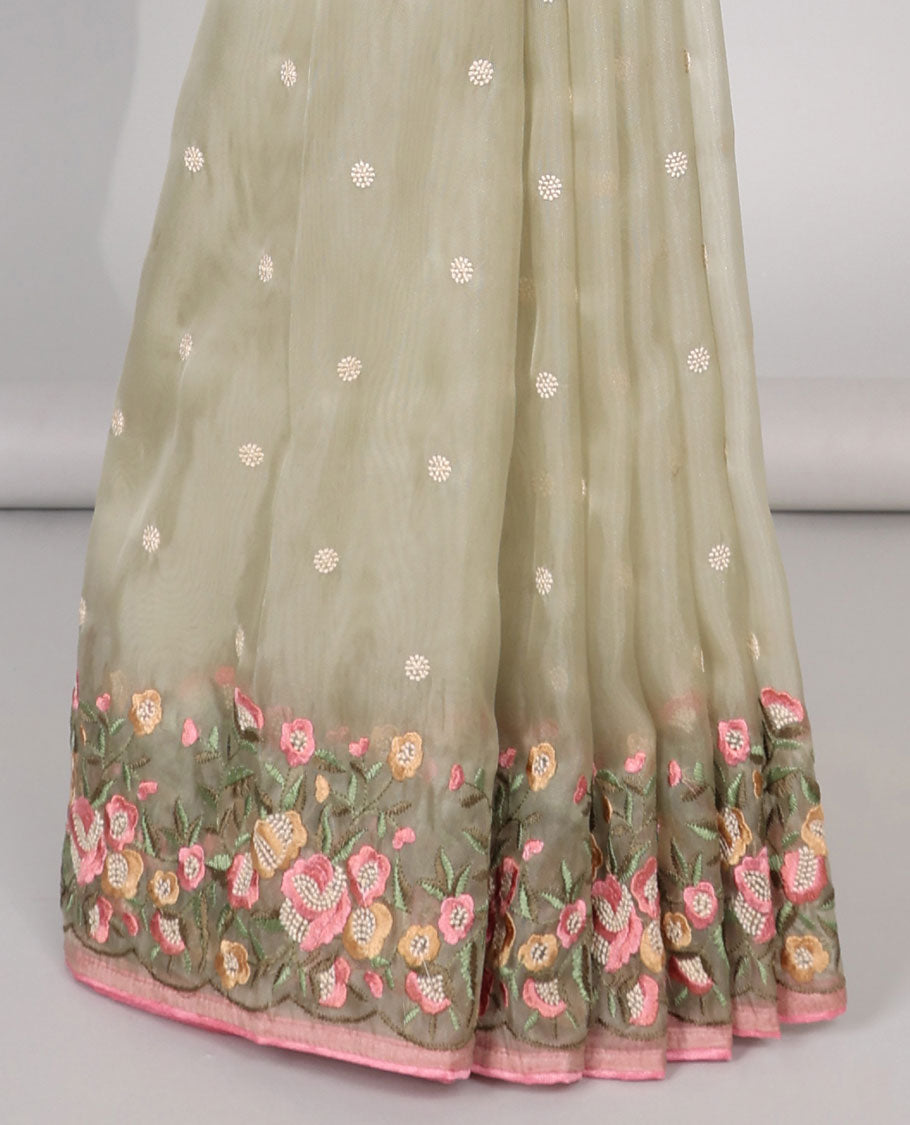 Light green motifs embroidery net designer saree with self floral border & floral embroidery pallu 