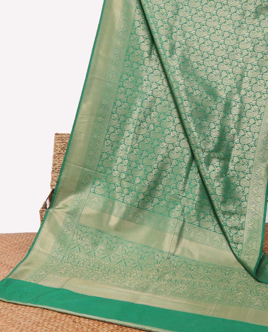 Green paisely design soft silk saree with self floral zari border & intricate zari design pallu