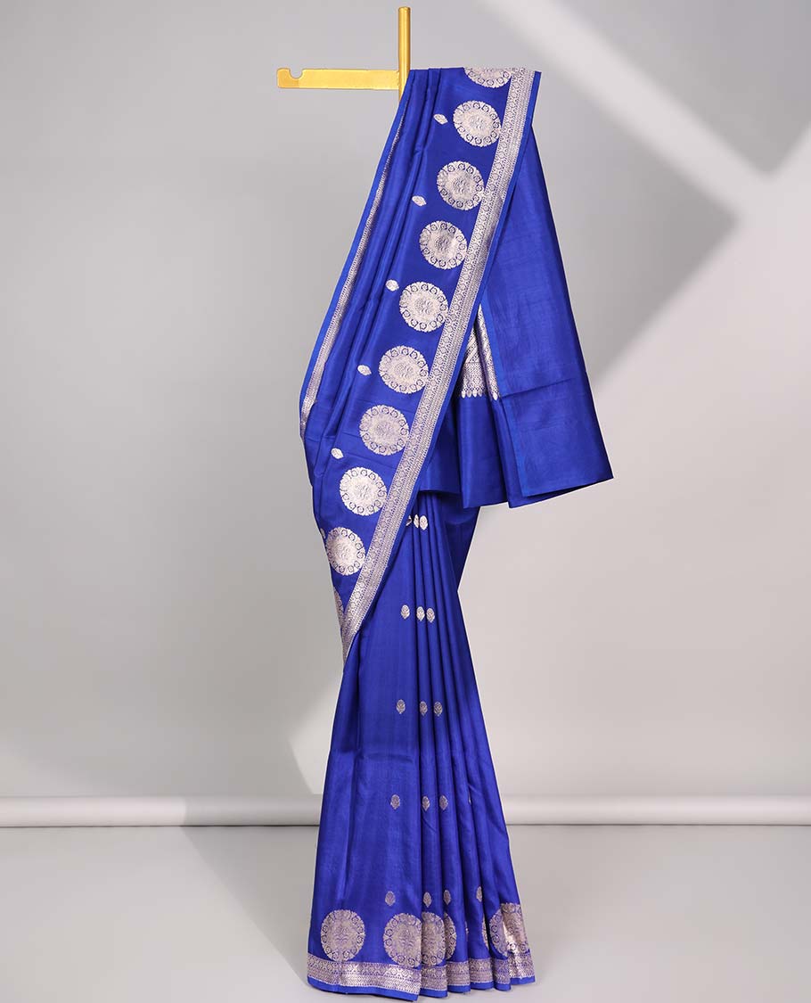 Blue floral buttas raw mango silk saree with self round buttas border & striped zari design pallu