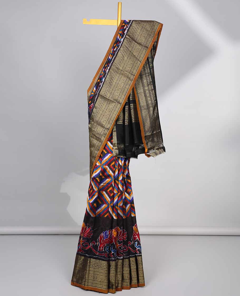 Black geometric, floral & animal design ikkat saree with contrast zari design border & traditional zari design pallu