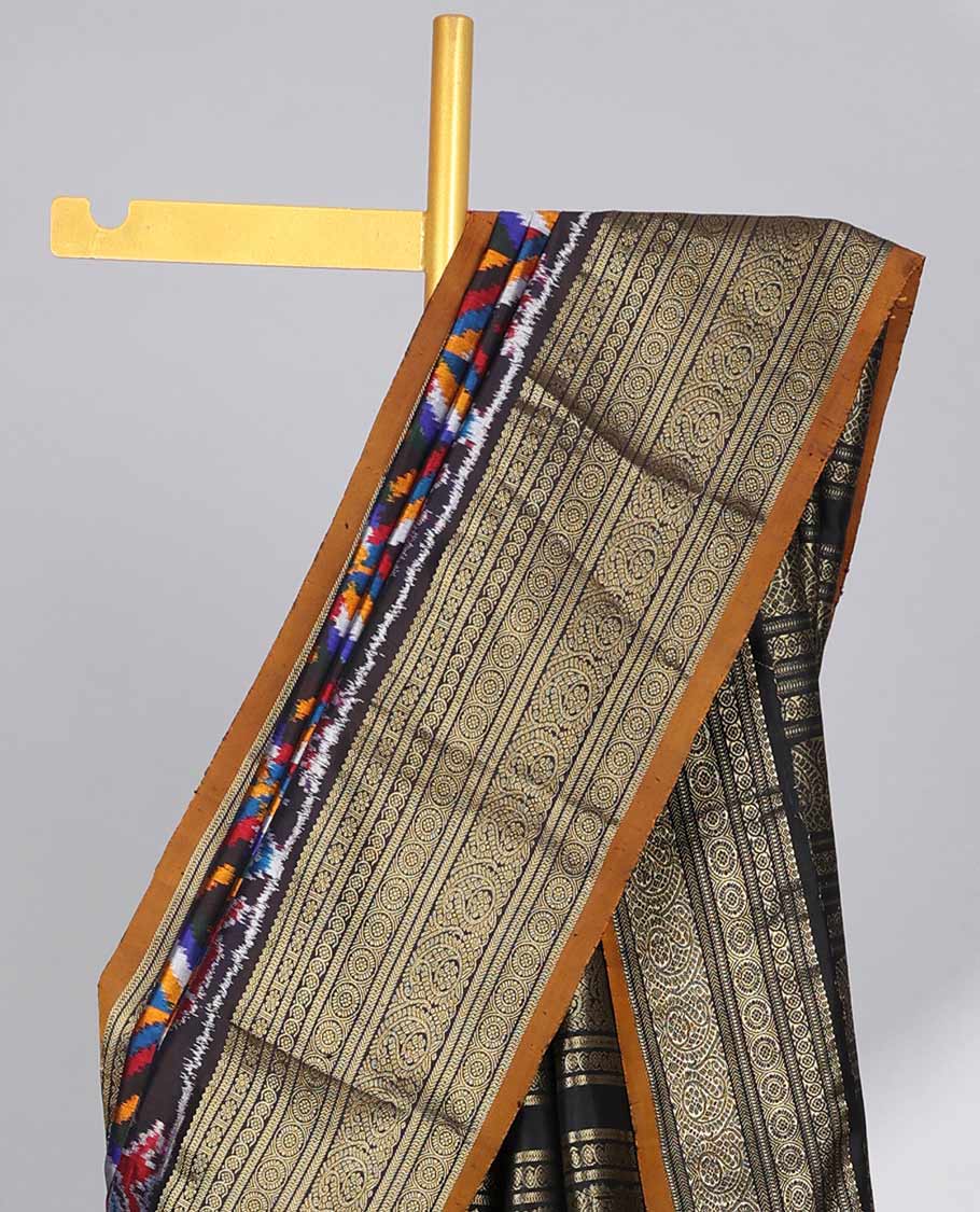 Black geometric, floral & animal design ikkat saree with contrast zari design border & traditional zari design pallu