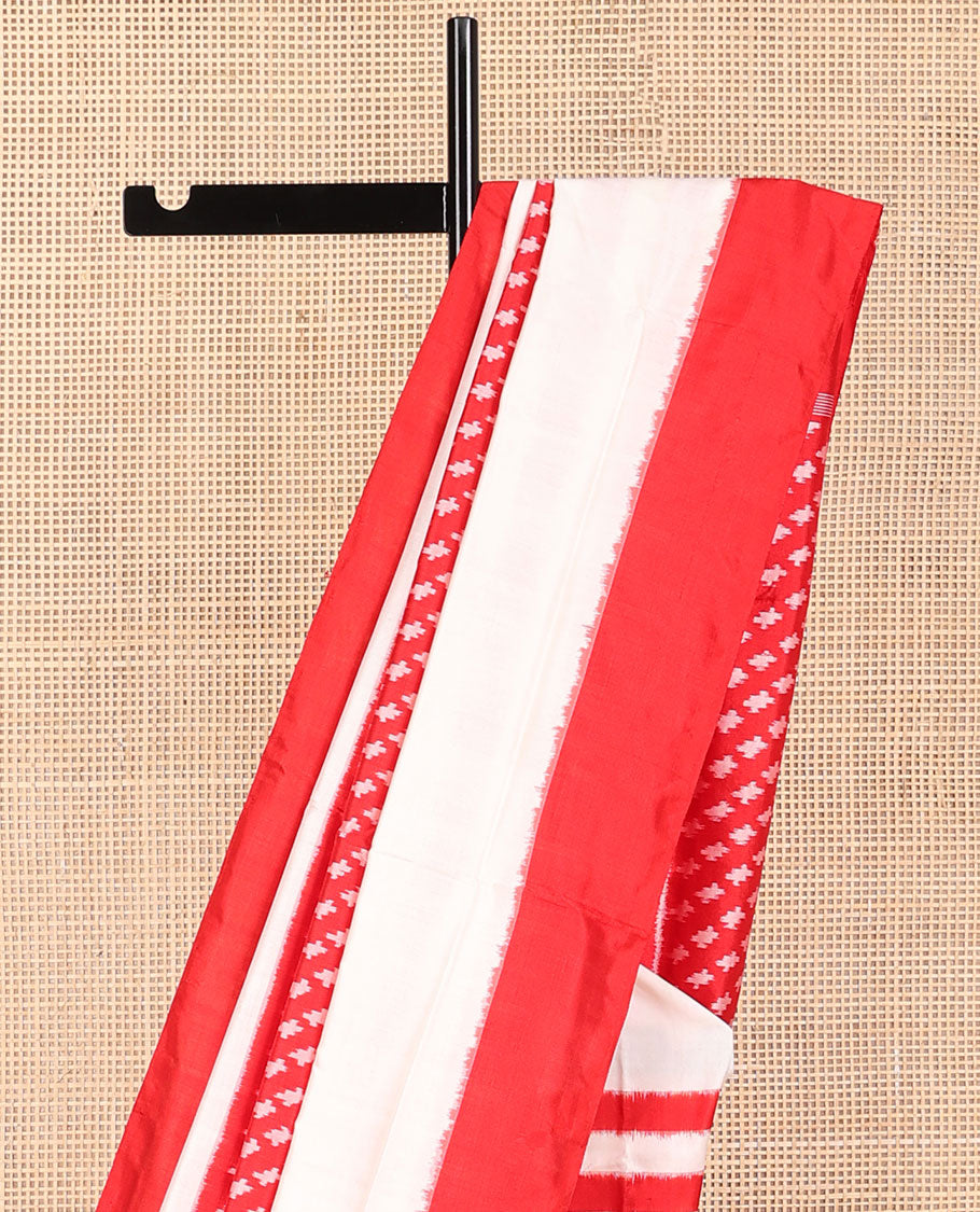 Red motifs ikkat saree with contrast striped border & floral motifs pallu