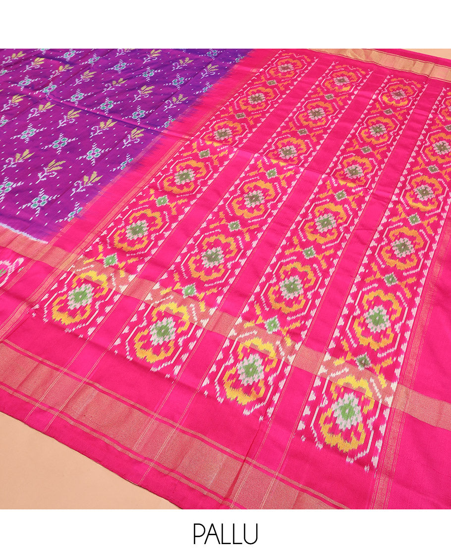 Rani Pink Ikkat Silk Saree Adorned with Colourful Buttas, Complemented by an Ikkat Woven Border, a Colourfully Woven Ikkat Pallu, and a Contrast Blouse