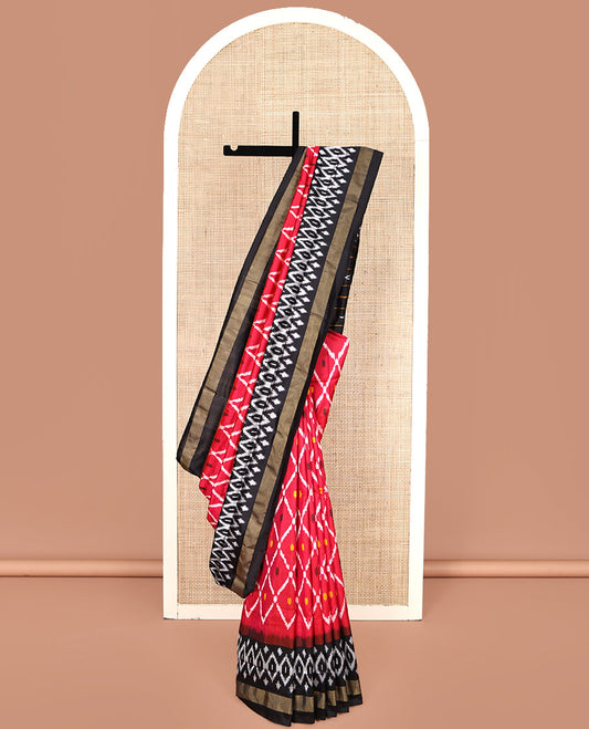 Red Pochampally Ikat Silk Saree, Elevated with Ikat Butta Enclosed Jaal Design, Complemented by a Contrast Ikkat Woven Border, Pallu of Ikkat Weave, and Paired with a Contrast Blouse