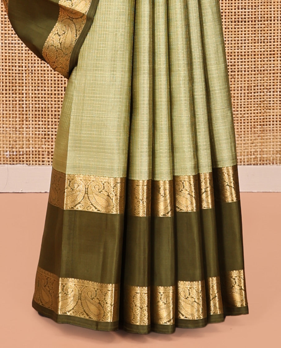 Green Kanchipuram Silk Saree, Sparsely Woven with Checks, Complemented by a Contrast Rettai Pettu Manga Border, Grand Jaal Pallu, and Contrast Blouse