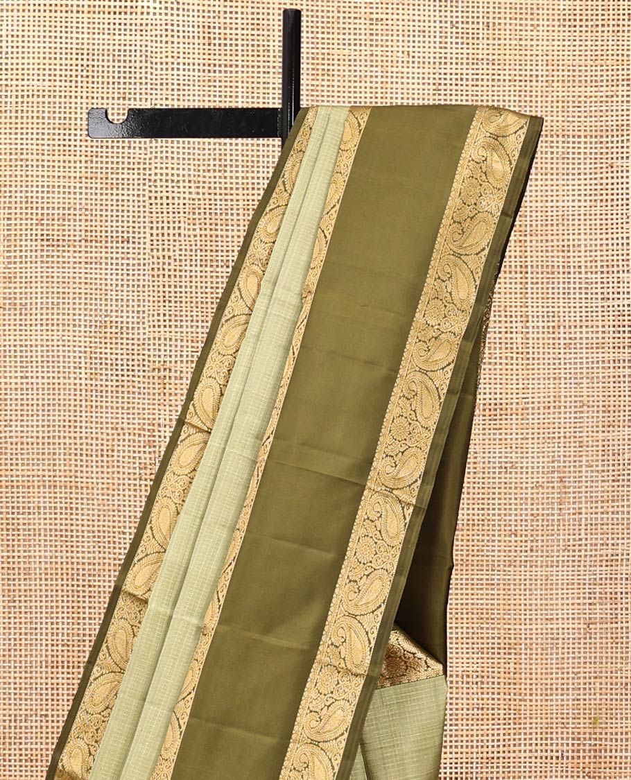 Green Kanchipuram Silk Saree, Sparsely Woven with Checks, Complemented by a Contrast Rettai Pettu Manga Border, Grand Jaal Pallu, and Contrast Blouse