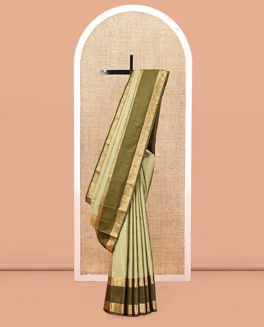 Green Kanchipuram Silk Saree, Sparsely Woven with Checks, Complemented by a Contrast Rettai Pettu Manga Border, Grand Jaal Pallu, and Contrast Blouse