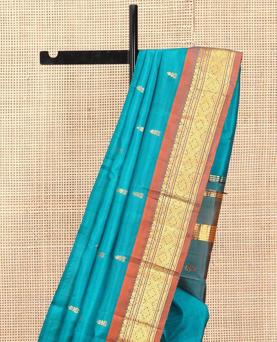 Blue Kanchipuram Silk Saree, Adorned with Zari Buttas, a Contrast One-Sided Zari Border, Zari Striped Pallu, and No Blouse