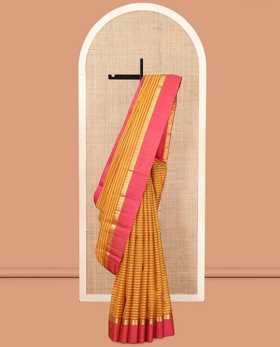 Yellow Striped Kanchipuram Silk Saree, Complemented by a Contrast Kal Eragina Border of Manga, Kathir, and Muthu Design, Pallu of Zari Design, and a Contrast Blouse