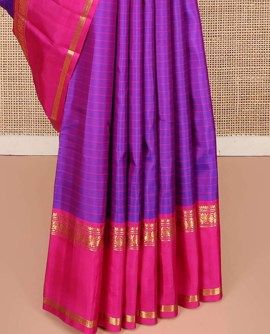 Violet Kanchipuram Silk Saree, Beautified with Stripes on Its Body, Complemented by a Contrast Rettai Pettu Border of Thilakam Mokku, Banaras, Muthu, and Mayil Designs, Subtly Zari Striped Pallu, and Paired with a Contrast Blouse