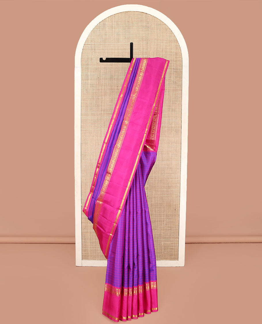 Violet Kanchipuram Silk Saree, Beautified with Stripes on Its Body, Complemented by a Contrast Rettai Pettu Border of Thilakam Mokku, Banaras, Muthu, and Mayil Designs, Subtly Zari Striped Pallu, and Paired with a Contrast Blouse