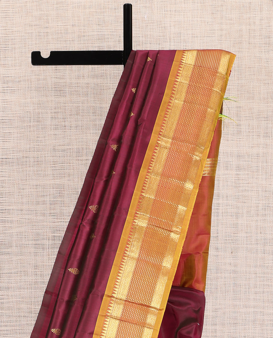 Maroon Kanchipuram Silk Saree, Graced with Zari Buttas,  a Contrast One-Sided Border of Rekku, Banaras, Muthu, and Mayil Kann Design, Zari Design Pallu, and No Blouse