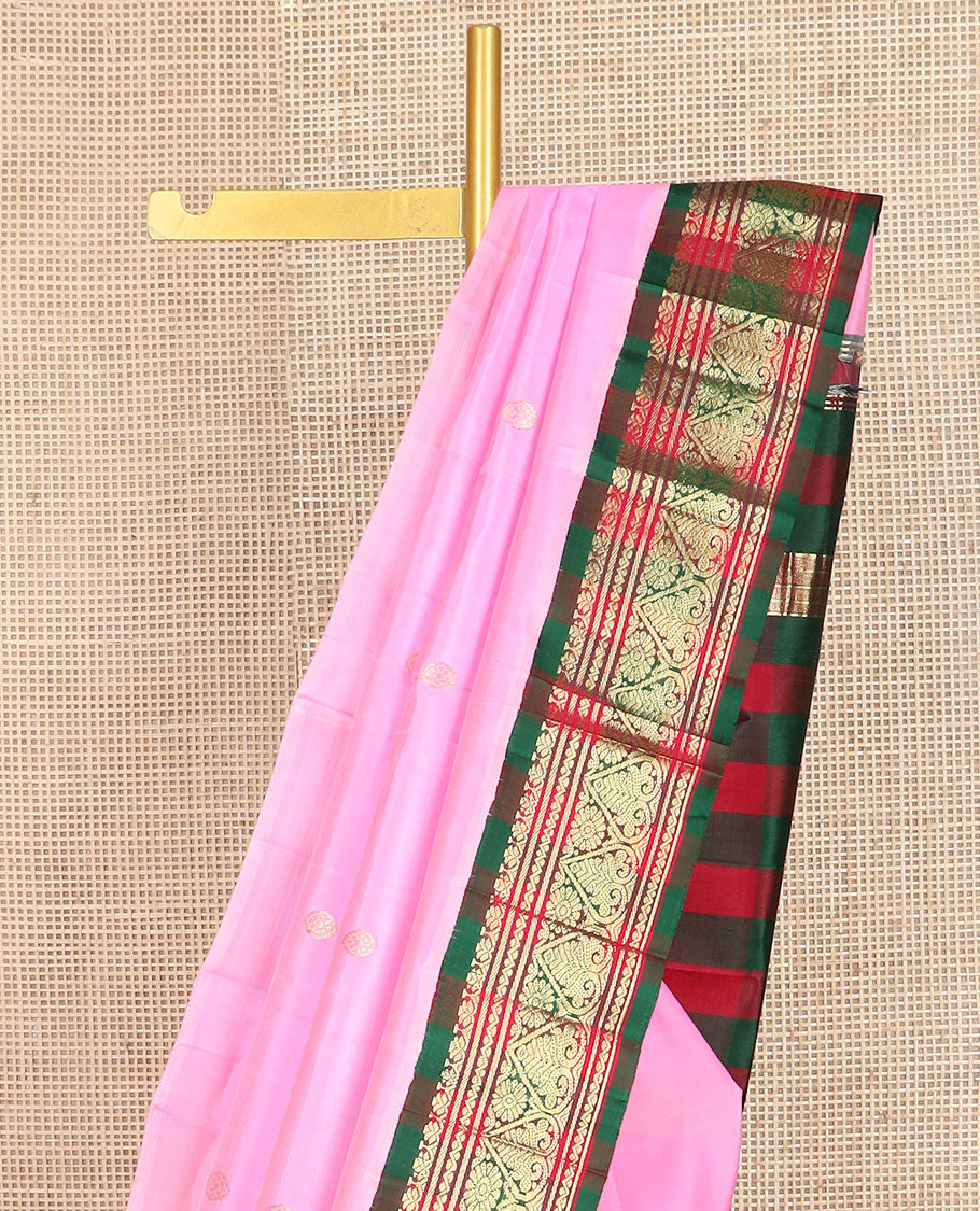 Pink zari buttas Kanchipuram silk saree, contrast one-sided korvai checked border of Banaras,neli & jada nagam & checked pallu of chakram design