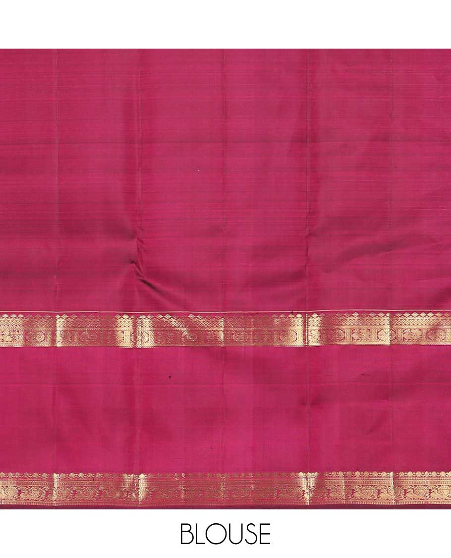 Red checked with zari buttas Kanchipuram silk saree, contrast rettai pettu border of thilakam, muthu, annam chakram designs, and jaal pallu